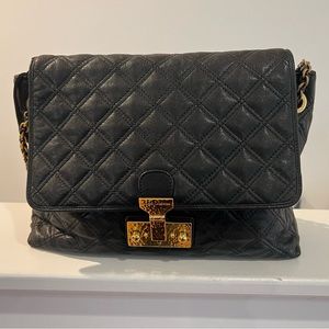 Marc Jacob’s version of Chanel shoulder bag. Beautiful dressy purse.